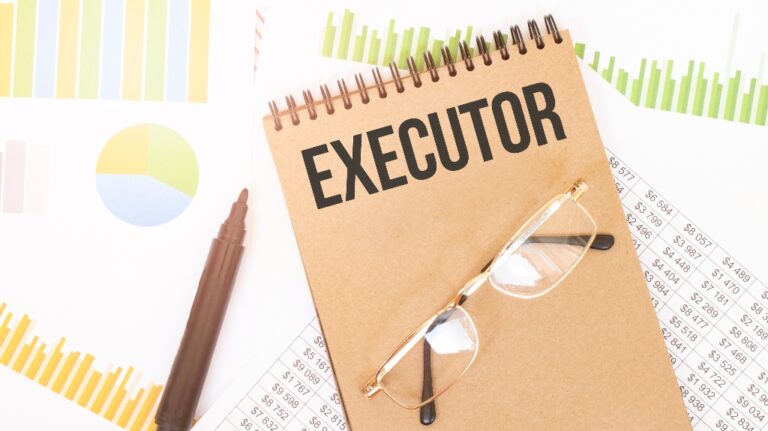 In a craft colour notebook is a executor inscription, next to pencils, glasses, graphs