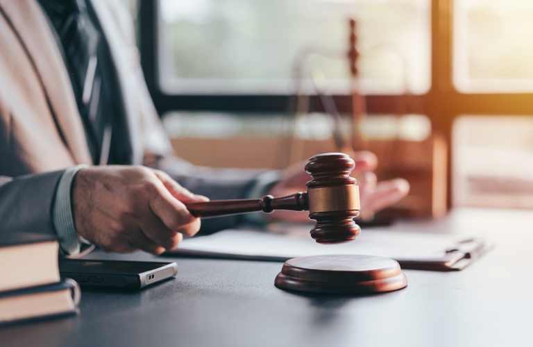 Lawyer is holding judge's gavel