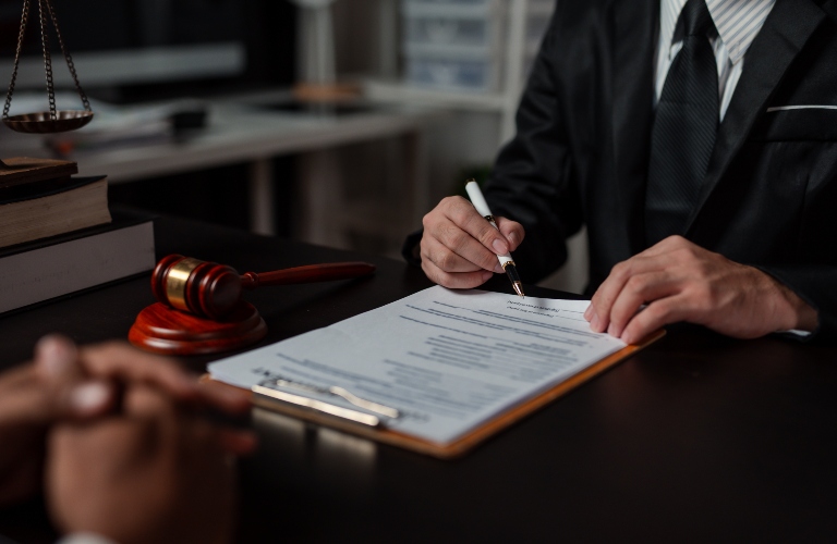 Lawyer is reviewing documents with client