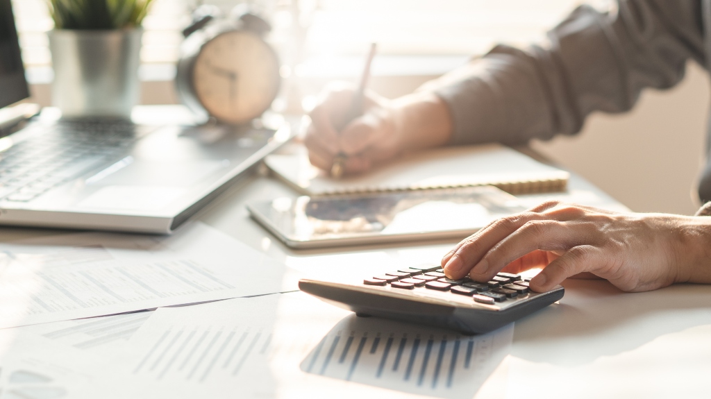 Man is calculating his expenses